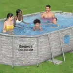בריכת Bestway Steel Pro Max אובלית עם דופן דמוי בריקים ושני חלונות, משפחה בתוך המים | yrz