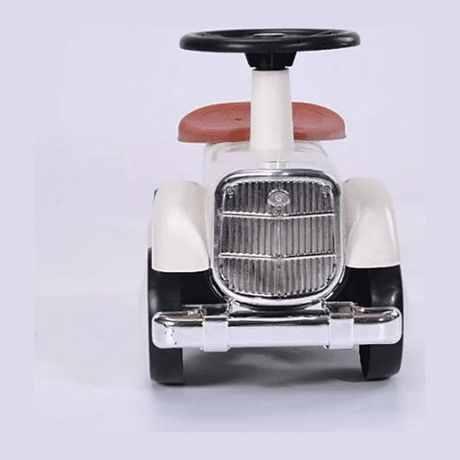 מבט חזיתי של בימבה וינטג׳ לפעוטות בצבע שמנת עם הגה שחור ומושב אדום